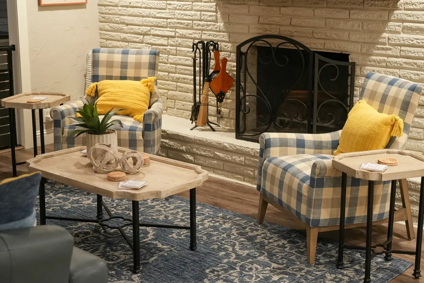 Reading chairs in front of the living room fireplace