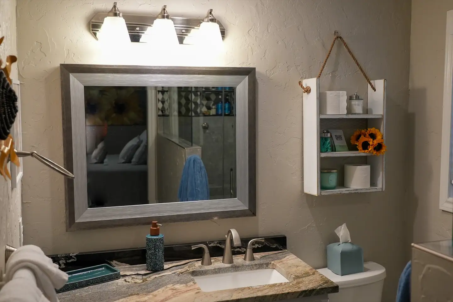 Sink area in bathroom attached to primary master bedroom