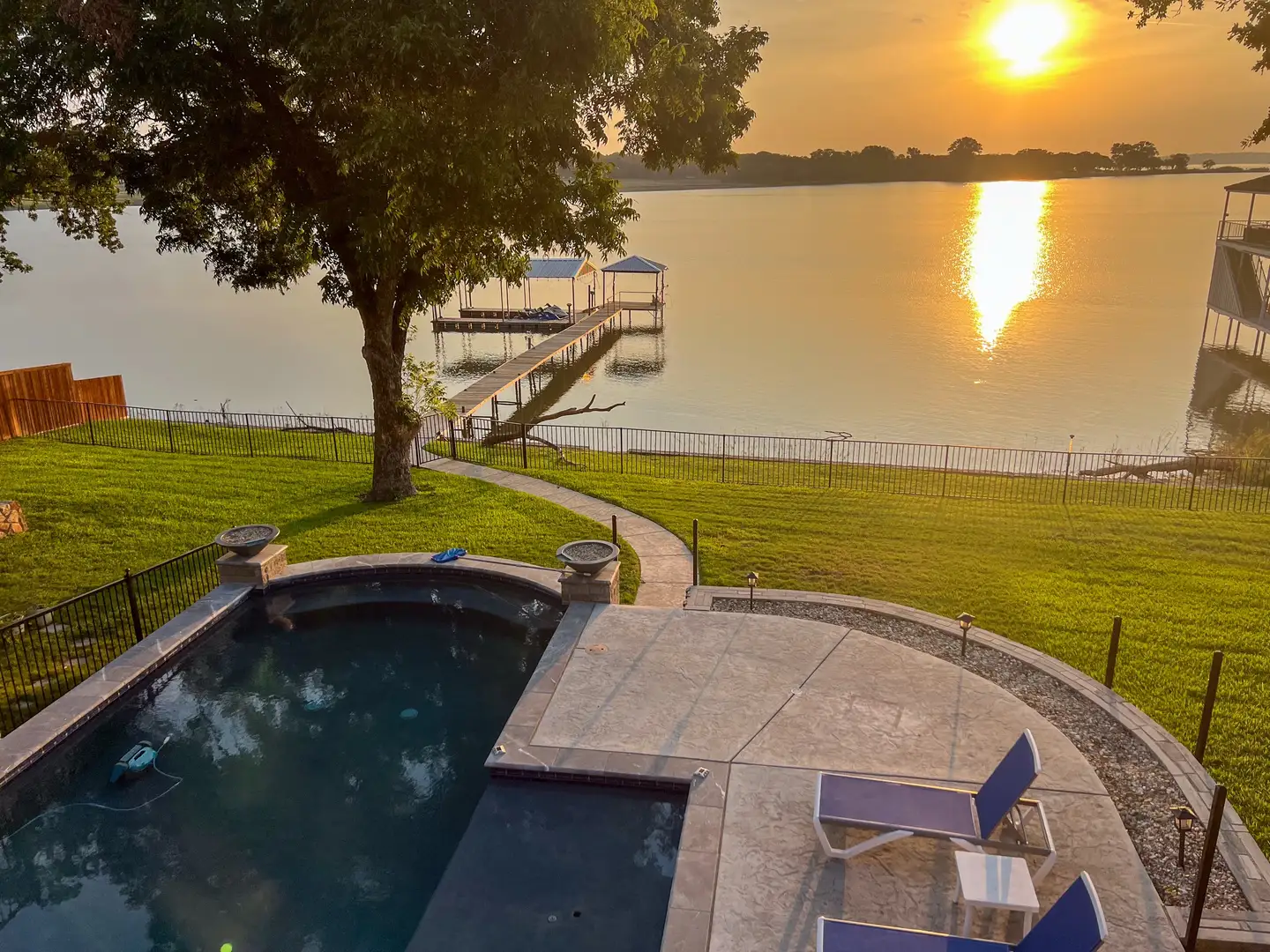Sunrise over the lake and pool